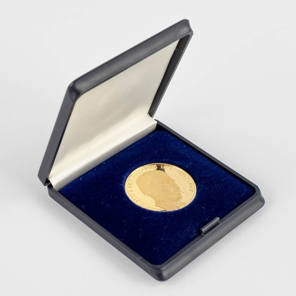 A gouden munt 'Albert 1, Rex Belgarum 1875-1934-1984', 18kt, 11,10g.