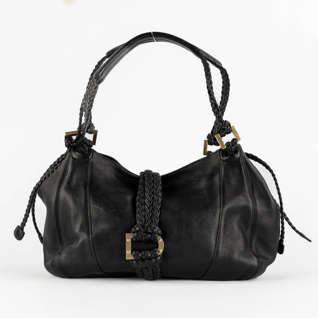Delvaux Eugène PM, a black leather handbag. (W:38 x H:26 cm)