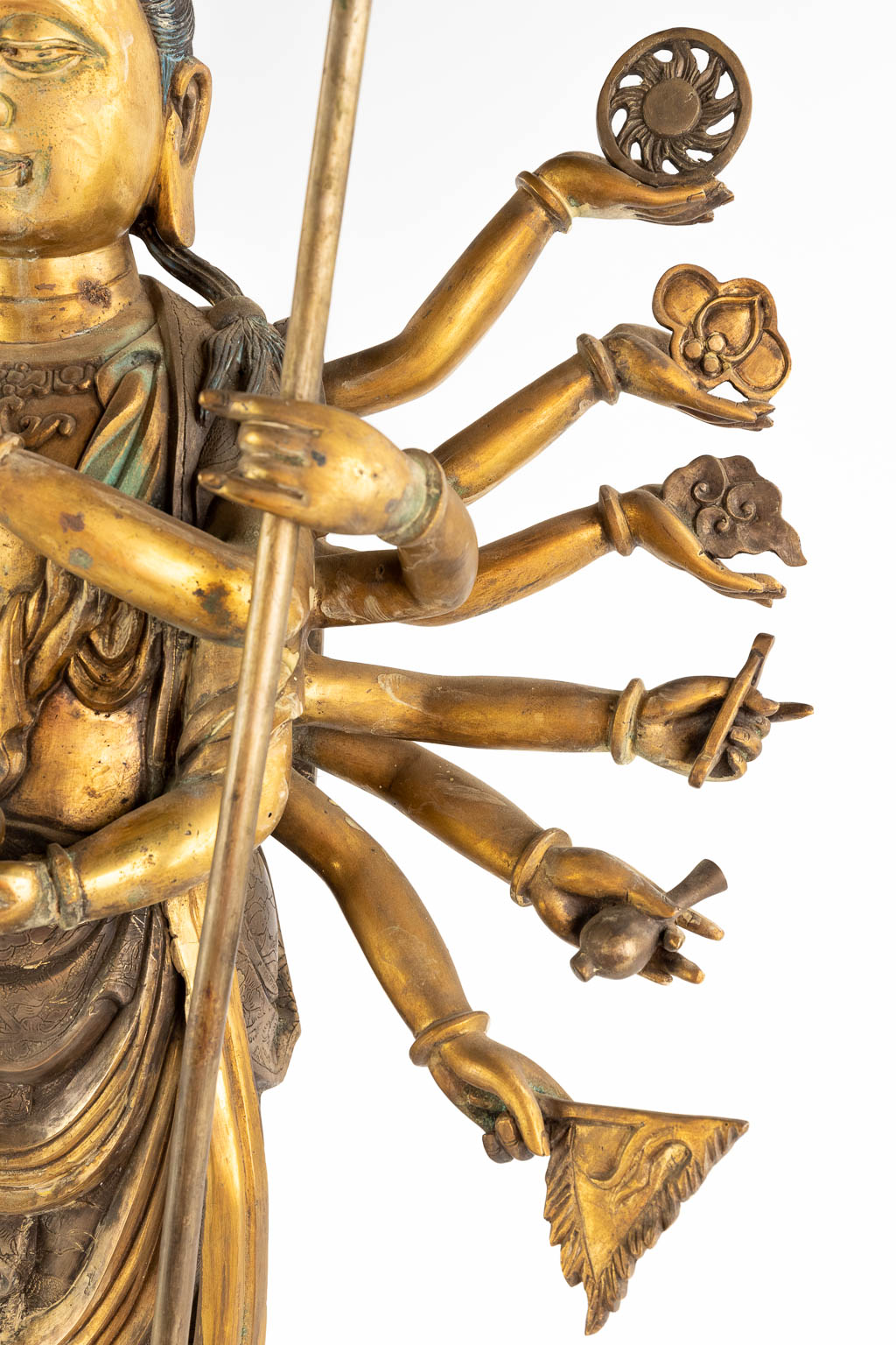 A Bodhisattva or GuanYin with 1000 arms, bronze with 18 arms and Taoist symbols. 20th C. (W:47 x H:78 cm)