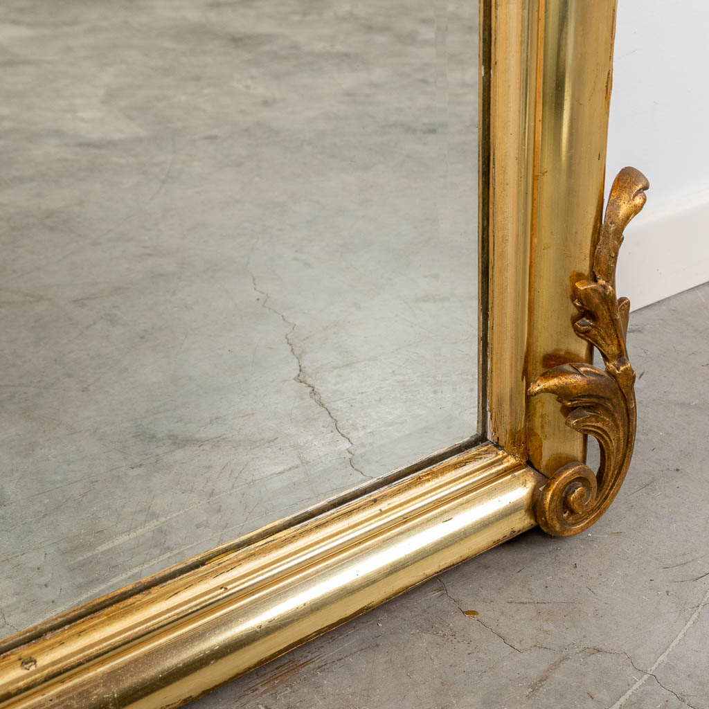 A mirror, gilt wood and stucco in Louis XV style. Circa 1900. (W:104 x H:180 cm)