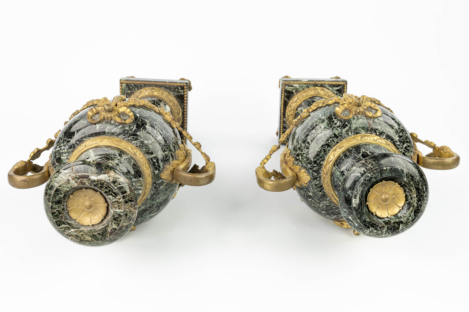 A pair of cassolettes made of green marble and mounted with gilt bronze. (H:51cm)