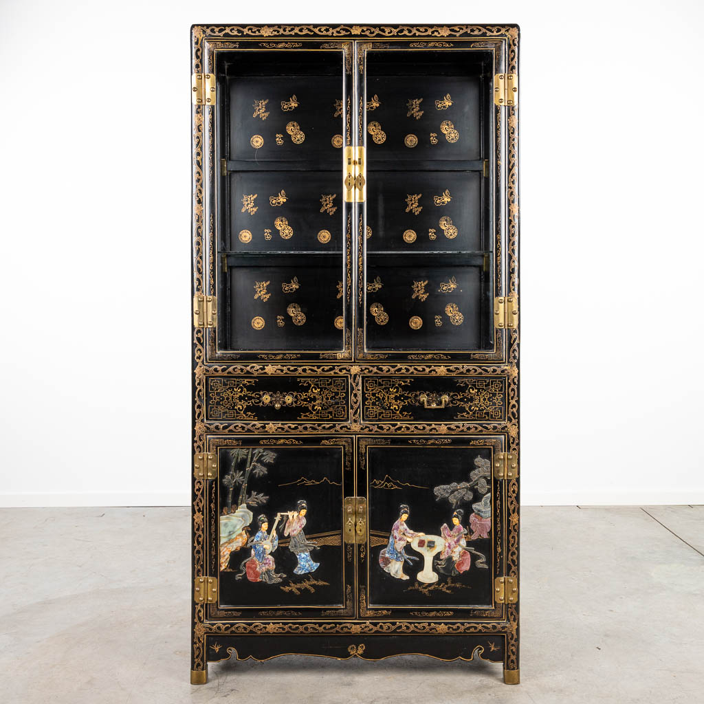Lot 082 A Chinese display cabinet in Oriental style and finished with hardstone. (H:148cm)