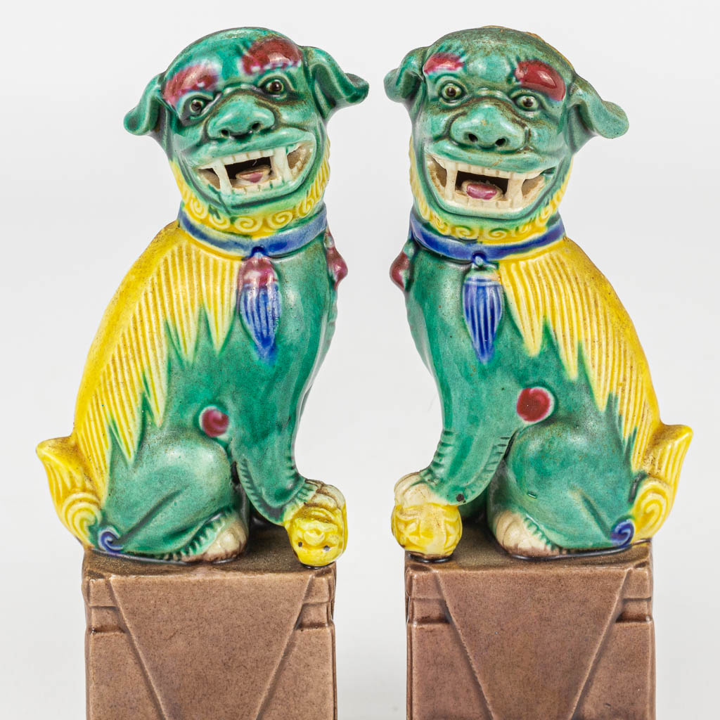 A collection of 2 pairs of Foo Dogs. 