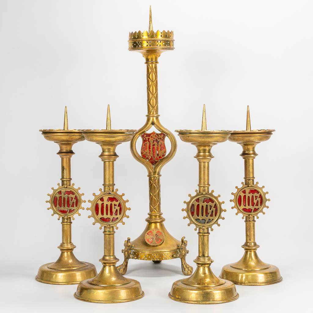 A collection of 5 bronze church candlesticks, neogothic style. 19th century. 