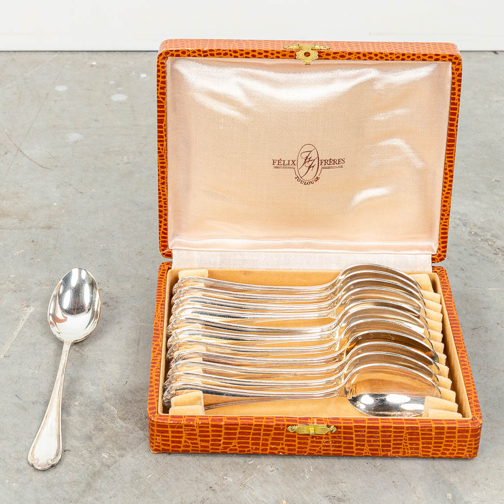 A 24-piece silver-plated cutlery in multiple boxes and marked Felix Frères. 