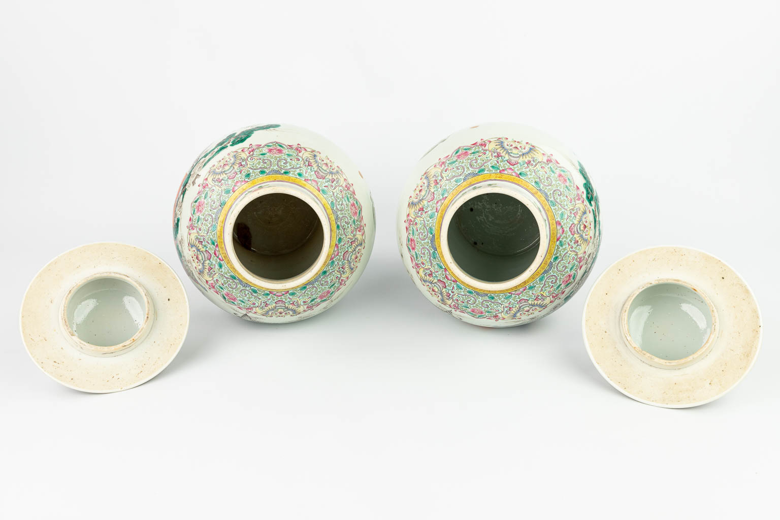 A pair of Chinese baluster vases with hand-painted decor 