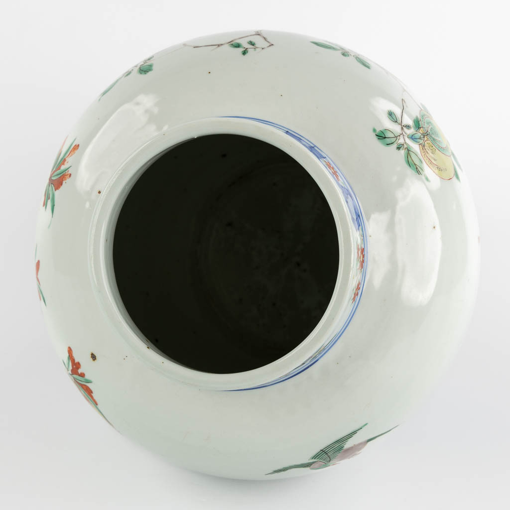 A Chinese pot, Wuchai decorated with growing fruits and blossoms. (H:31 x D:25 cm)