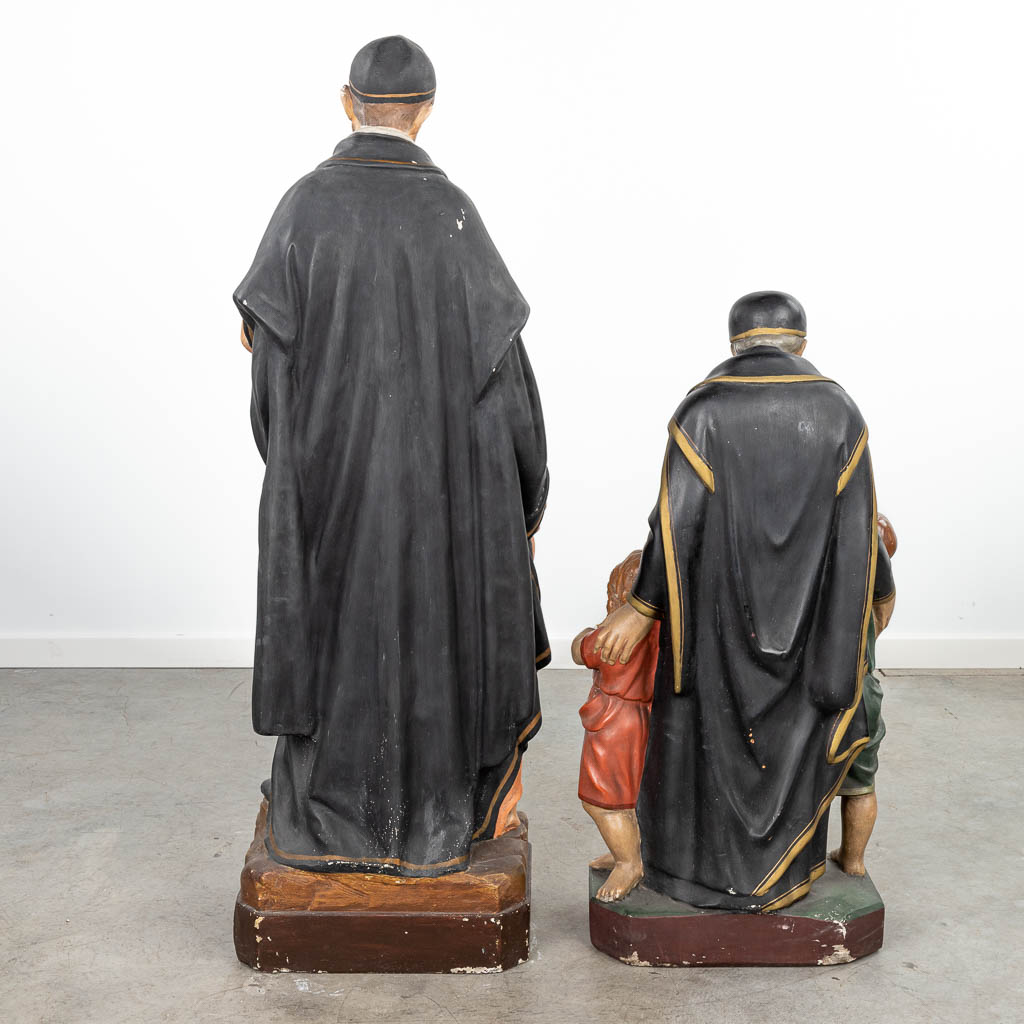 A set of 2 large polychrome plaster statues of Holy Vincentius. (H:114cm)