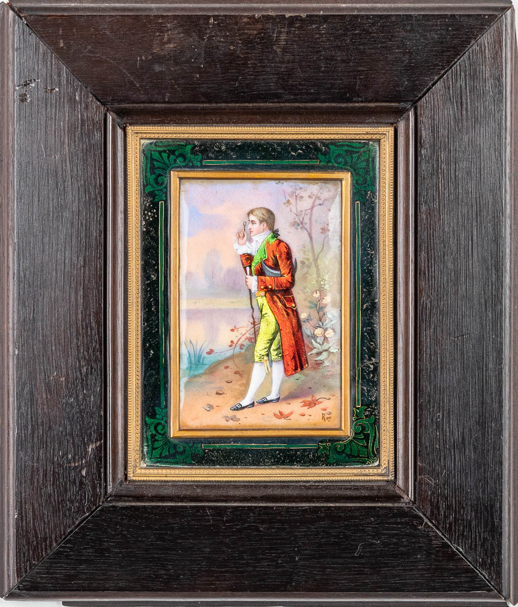 A pair of hand-painted enamel plaques mounted in ebonised wood frames, marked Roy. (H:15,5cm)