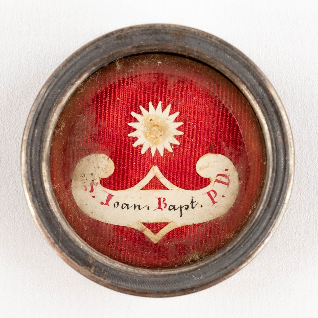Three sealed theca with relics for Joannis Babtist, Barbara V.M., Dympnae Virg. (H:1,1 x D:4 cm)