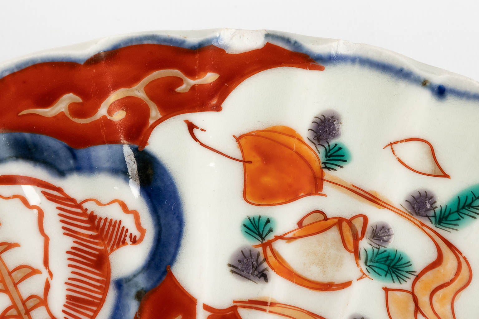 Elf sierborden, Japans Imari porselein, 19de/20ste eeuw. (D:22 cm)