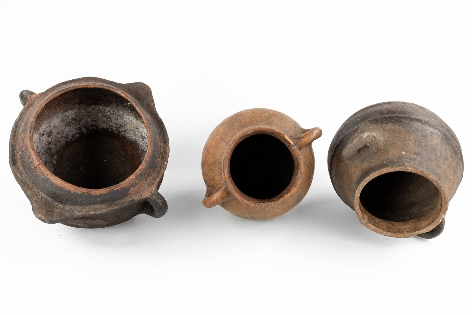 Three antique jugs. (D:22 x W:24 x H:27 cm)
