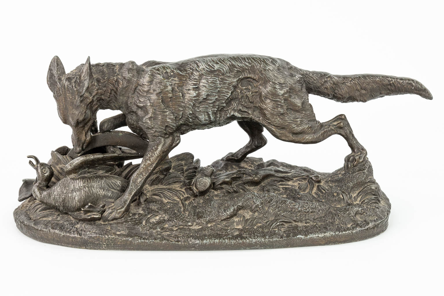 A collection of 3 figurines of animals, made of bronze and spelter. A lion, wolf and bear. (H:11cm)