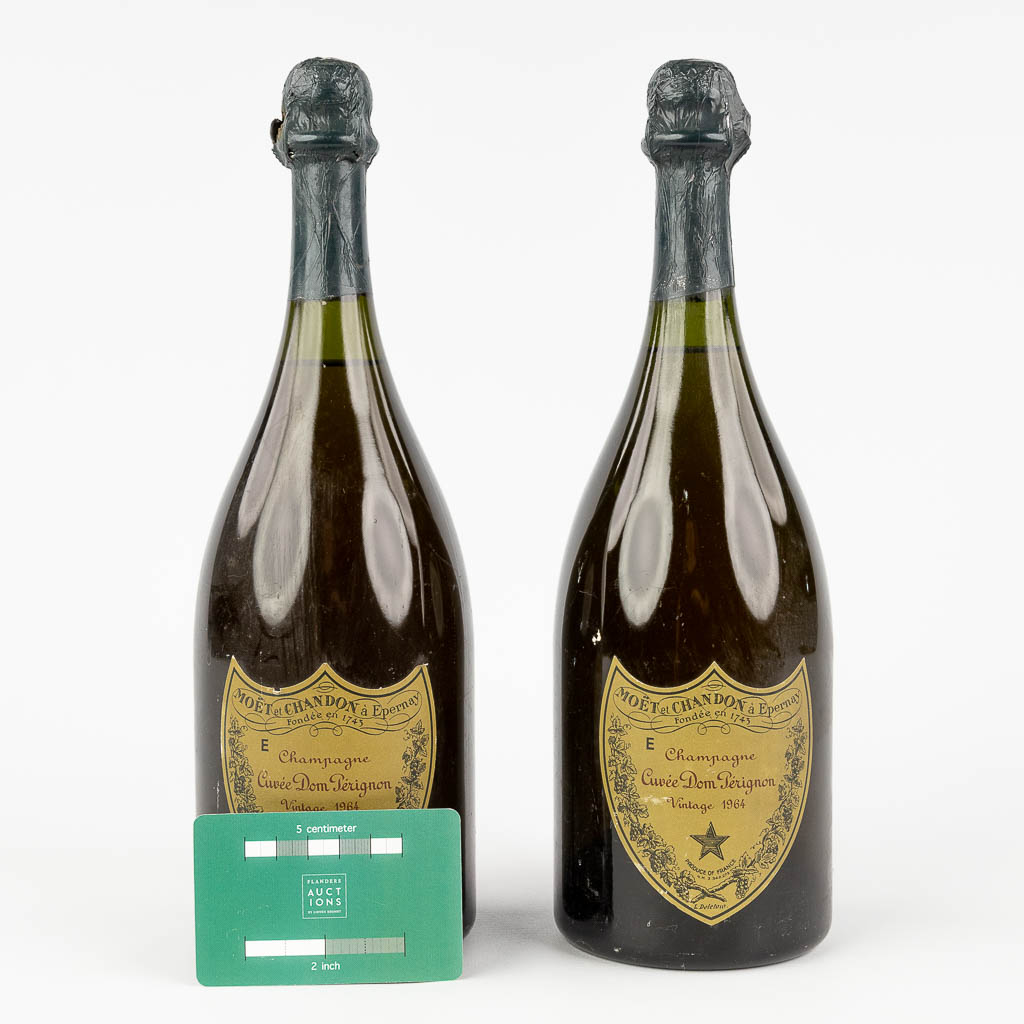 Dom Pérignom, a pair of Champagne bottles, 1964. 