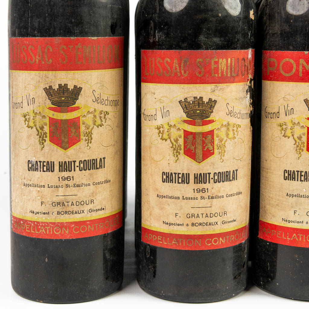 Een collectie antieke en vintage wijnflessen, waaronder 1 x 'Château La Fleur Petrus' 1967 (H:30cm)