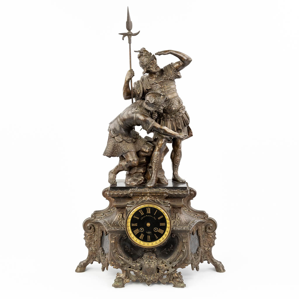 A mantle clock 'The Spanish Warriror's' made of spelter.  (W:43 x H:74 cm)