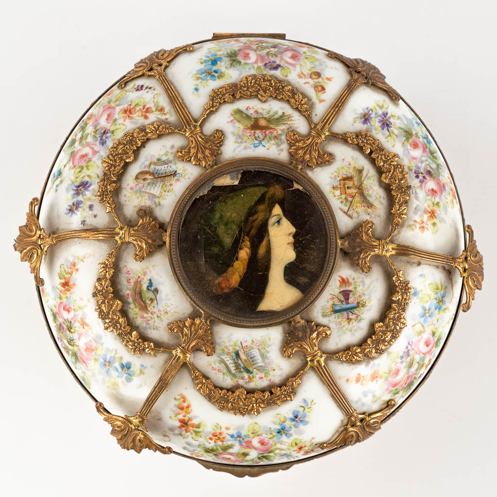 A porcelain Jewelry box, porcelain mounted with bronze. hand-painted flower decor. (H:12 x D:21 cm)