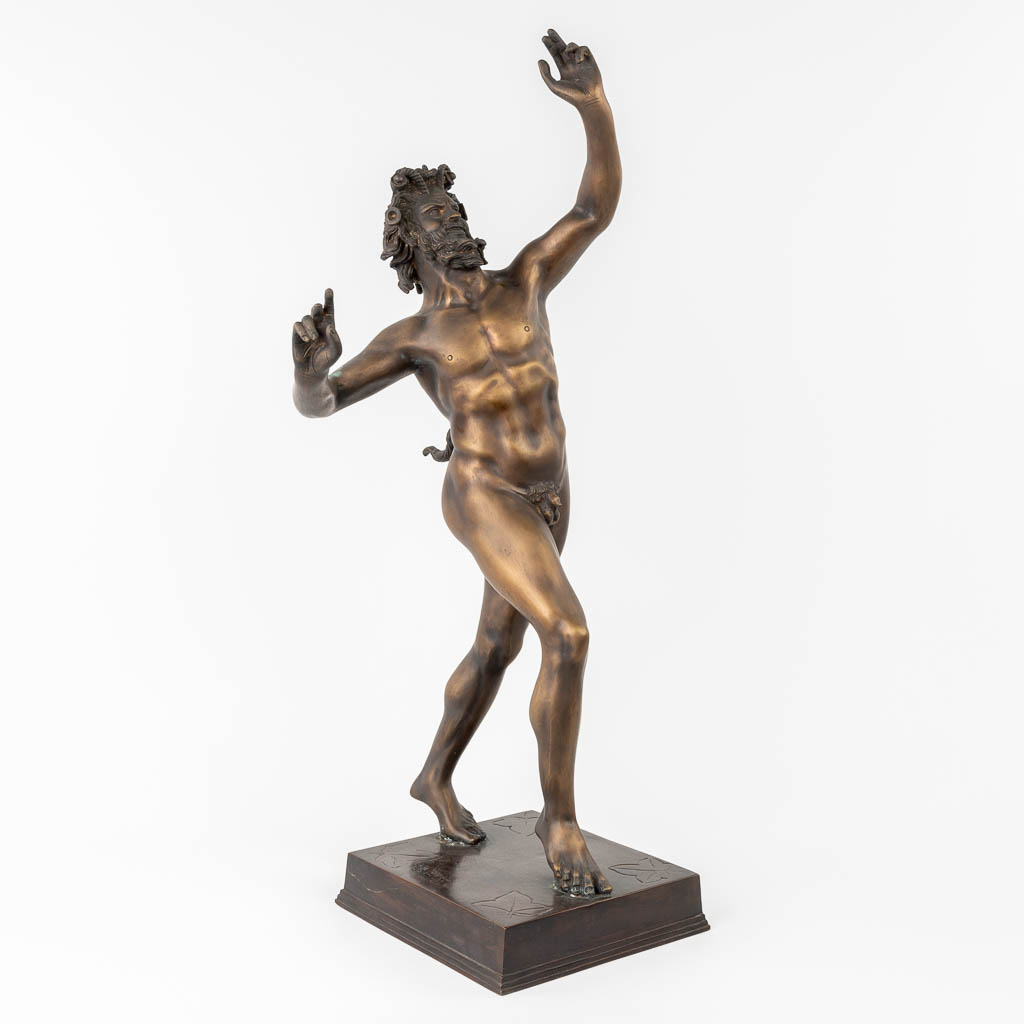  A figurine of a Satyr, made of bronze. 20th C. (L:26 x W:24 x H:80 cm)