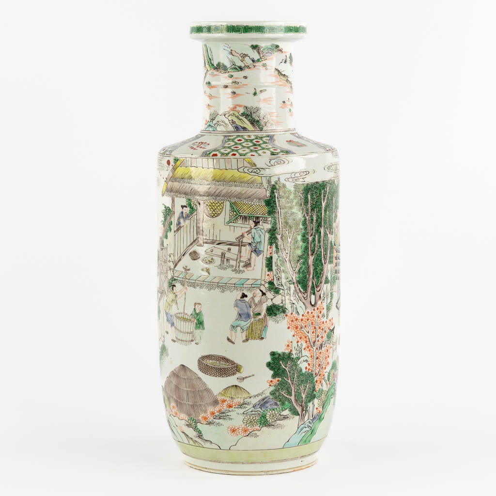 A Chinese Famille Verte 'Roulleau' vase with scènes of rice production. (H:46 x D:18 cm)