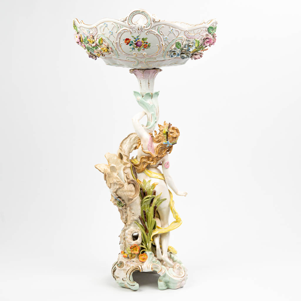 An exceptional table centrepiece made of porcelain with hand-painted decor and figurines. Made in Germany