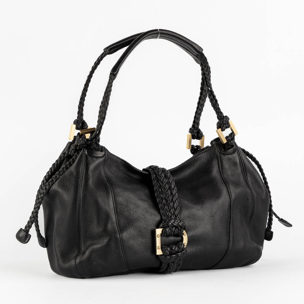Delvaux Eugène PM, a black leather handbag. (W:38 x H:26 cm)