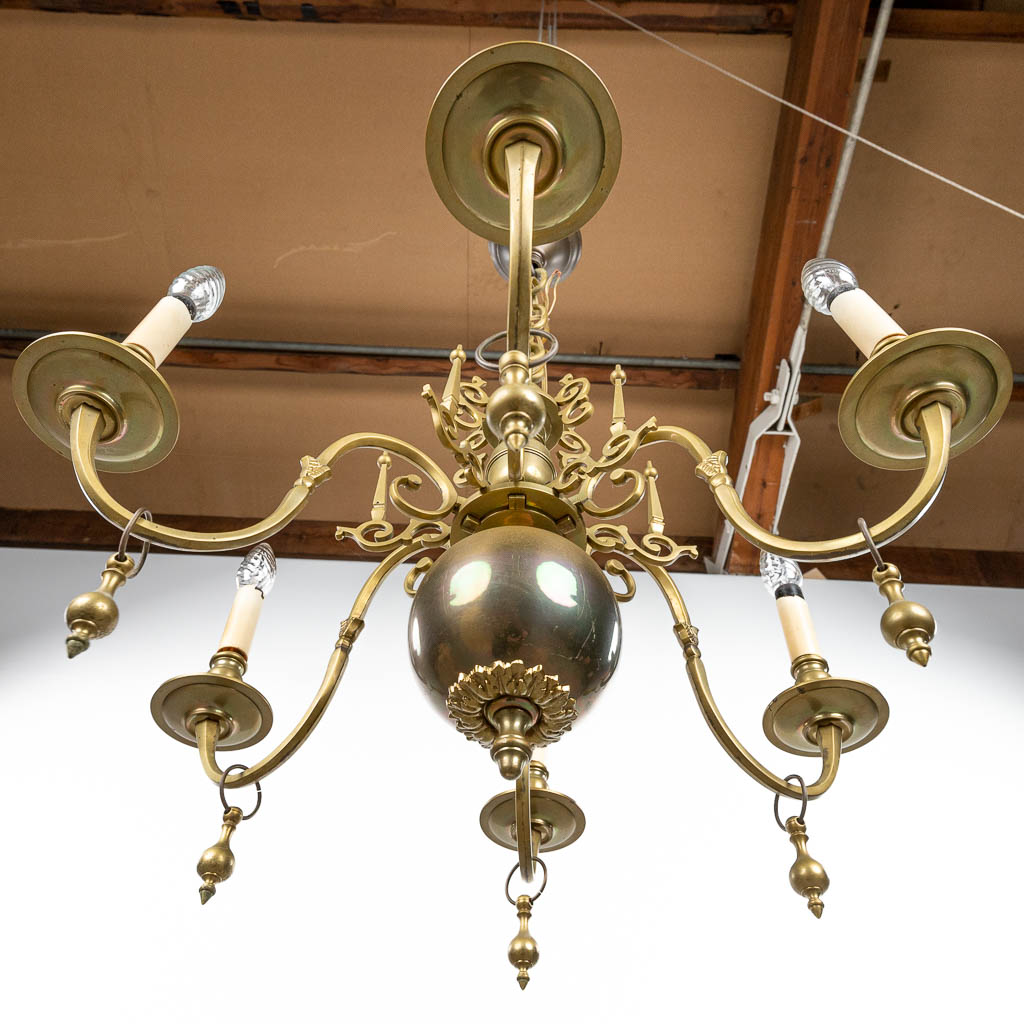 A chandelier in Flemish style and made of bronze by Brondel in Bruges. (H:47cm)