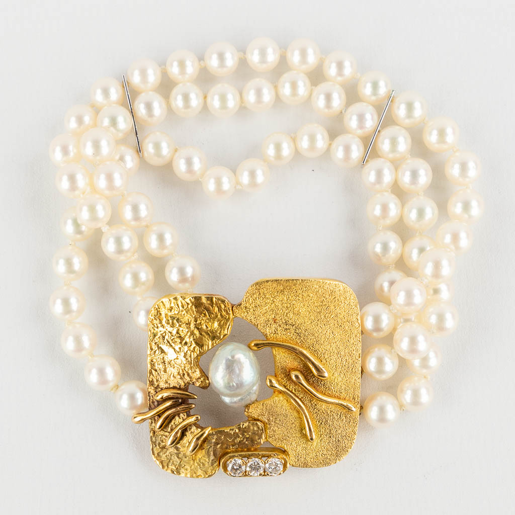 Wolfers Frères, a bracelet, necklace, pearls and 18kt gold. 20th C. (D:43 cm)