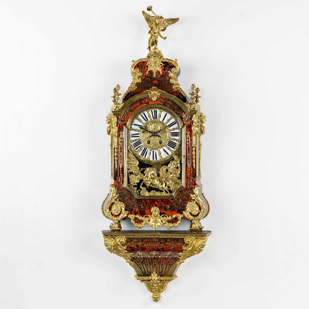 Lot 028 A cartel clock on a stand, tortoiseshell inlay mounted with gilt bronze. Japy Frères, 19th C. (L:17 x W:42 x H:115 cm)