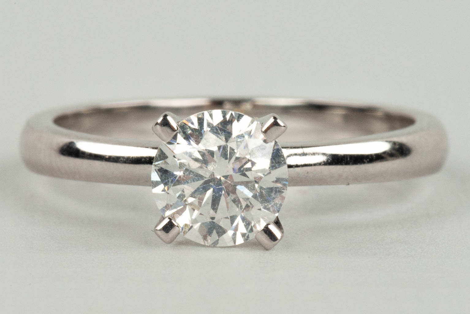 An engagement ring with a solitaire stone in a white gold ring. 1.01 carats. 