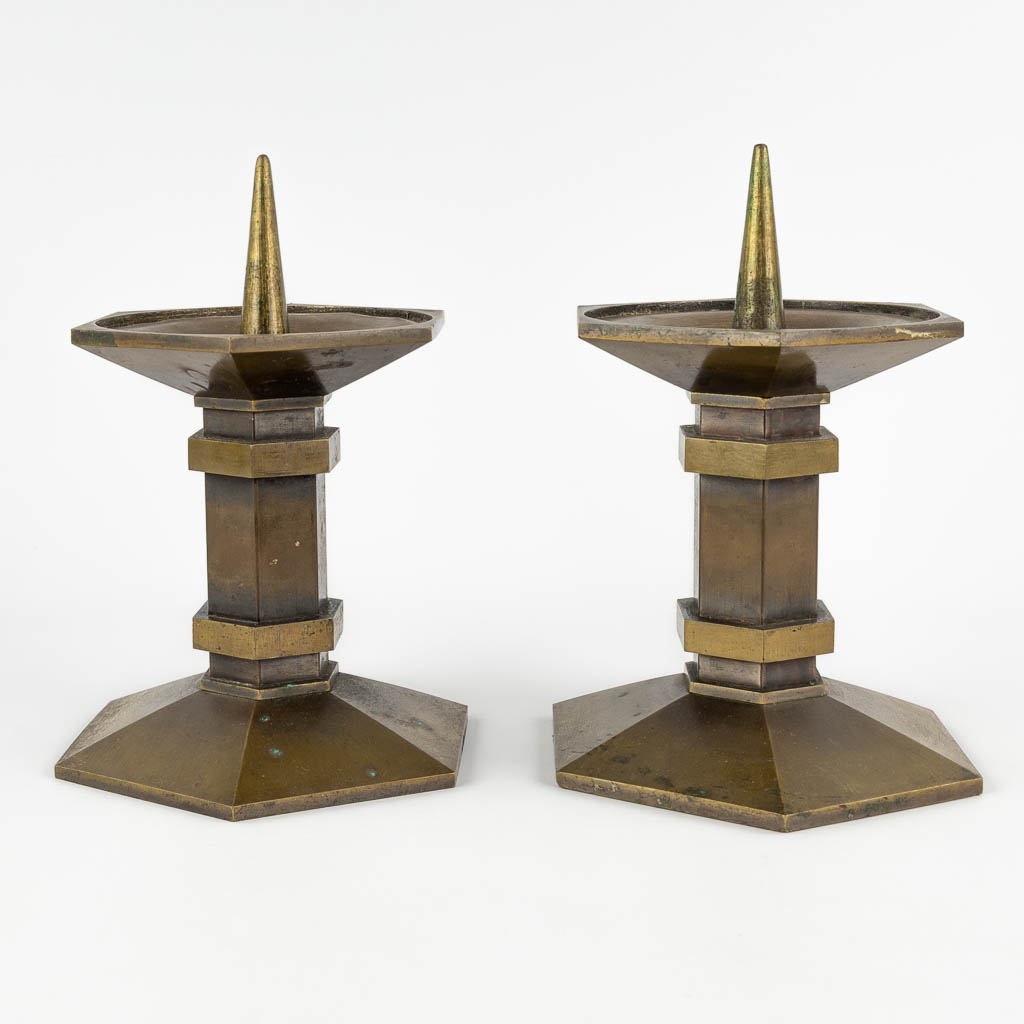 A pair of church candlesticks, bronze in art deco style. 20th C. (H:27 x D:17,5 cm)