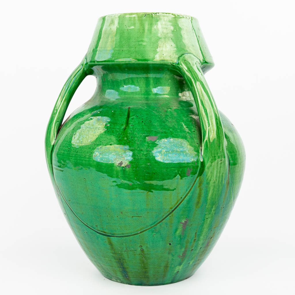 A large vase made of Flemish earthenware with green glaze. (H:39cm)