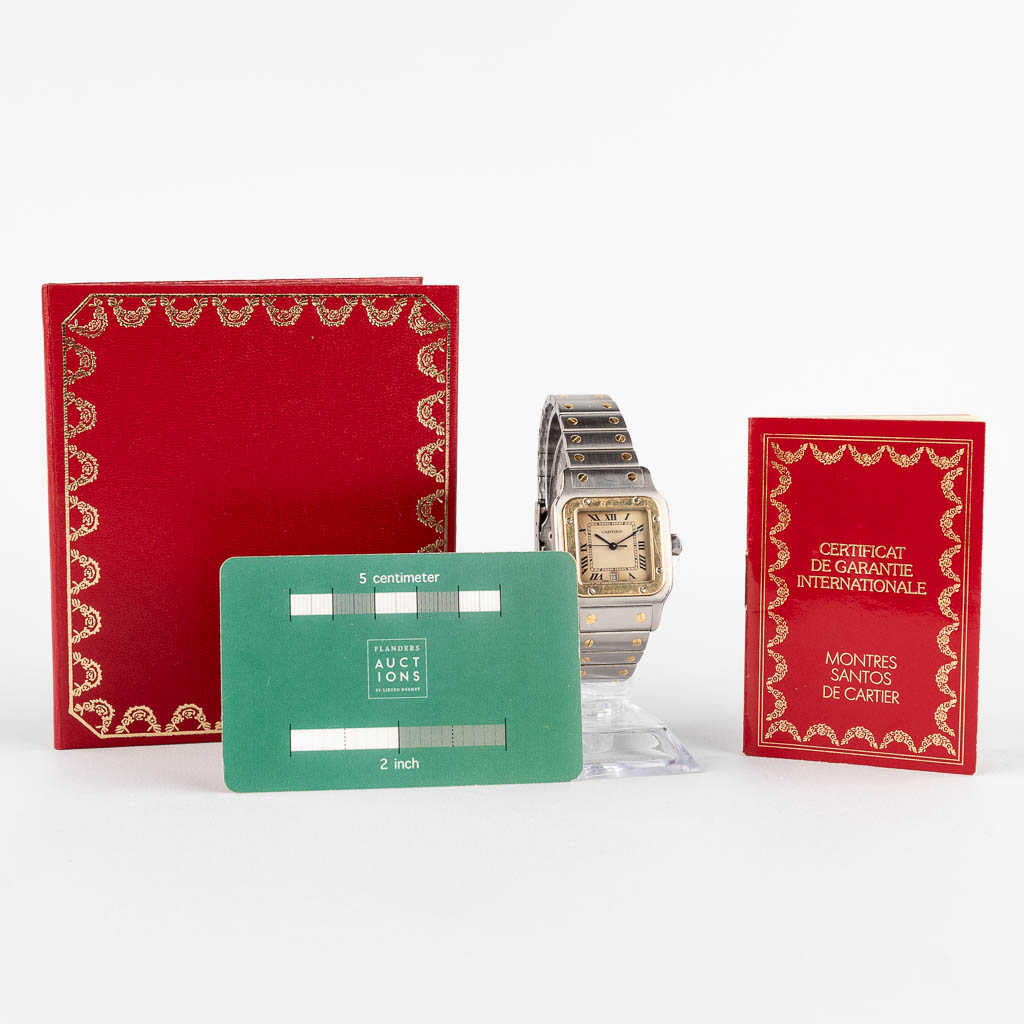 Cartier Santos, a men's wristwatch, steel and gold-plated. Quartz. 1990.  (W:2,9 x H:4,1 cm)