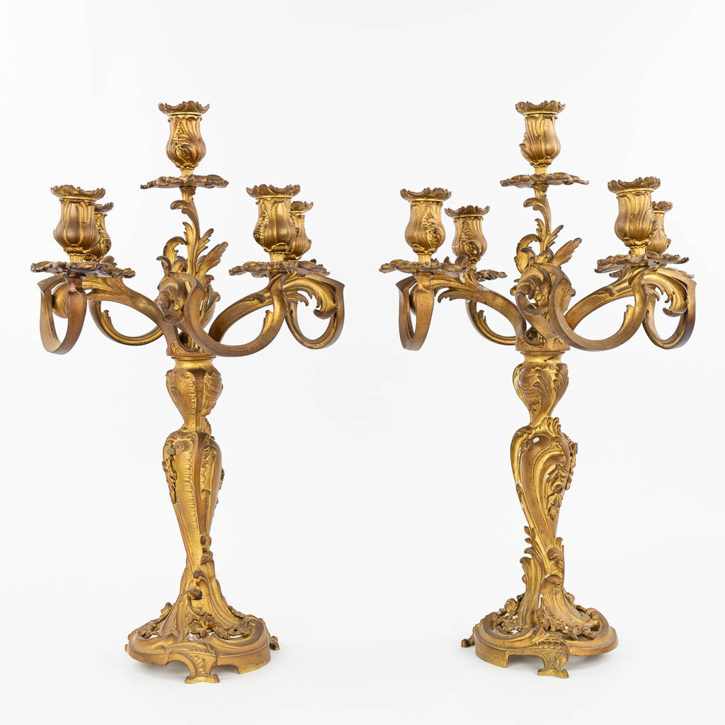 A pair of candelabra made of gilt bronze in Rococo style. (H:58cm)