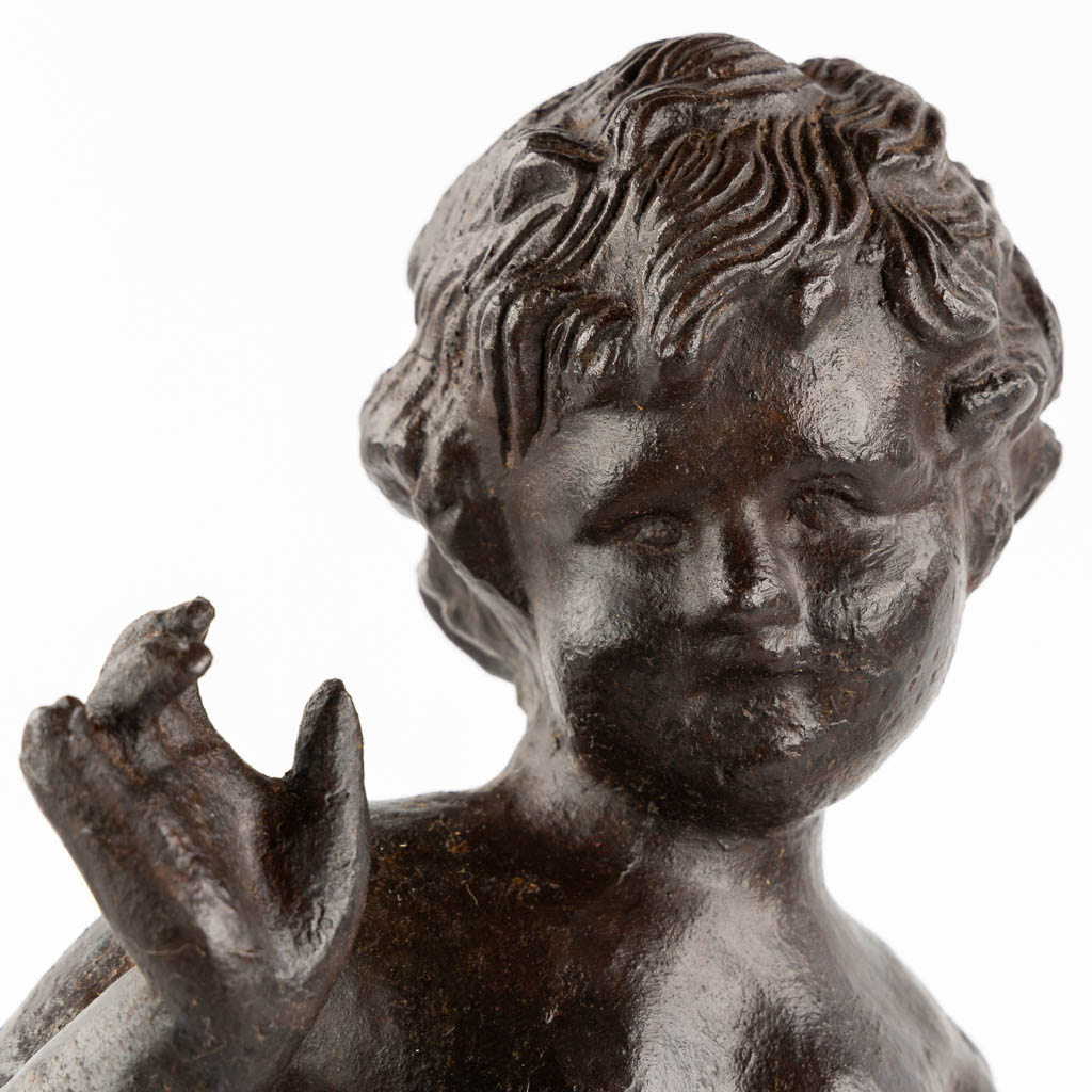 Beeld van een jongeman, gietijzer of fonte. (W:17 x H:53 cm)