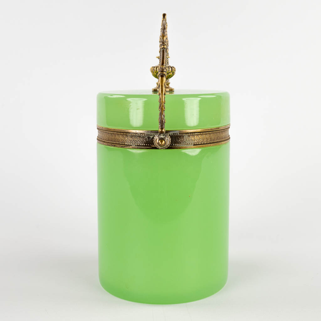 A green storage box, Opaline glass mounted with brass. 20th C. (D:12,5 x W:16 x H:26 cm)