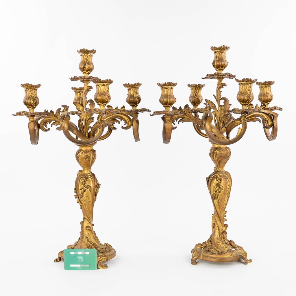 A pair of candelabra made of gilt bronze in Rococo style. (H:58cm)