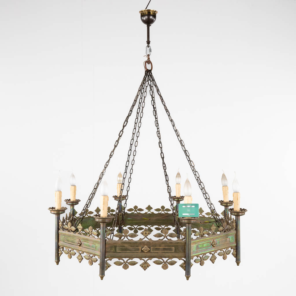 A large church chandelier in octagonal shape, bronze in Gothic Revival style. 19th C. (H:40 x D:101 cm)