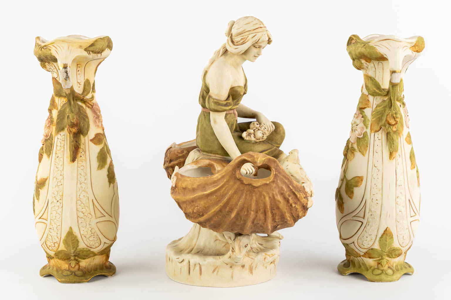 Royal Dux, a pair of vases and a lady with two baskets. Polychrome porcelain. (L:17 x W:36 x H:32 cm)
