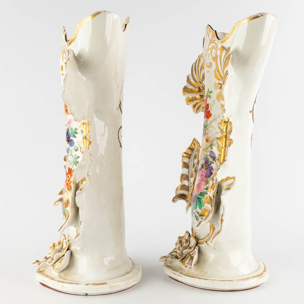 A pair of large Vieux Bruxelles porcelain vases with hand-painted flower decor. 19th C. (D:23 x W:36 x H:53 cm)
