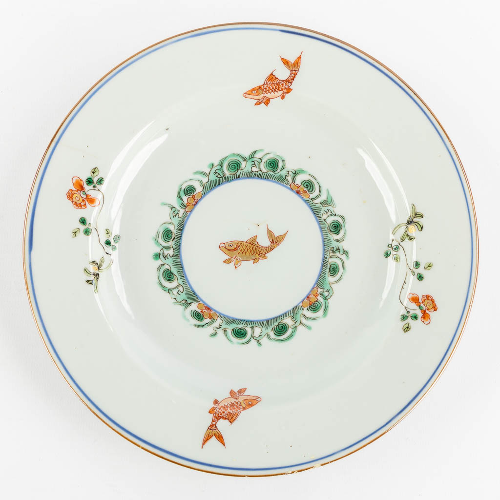 Ten Chinese Famille Rose plates, Carp and flowers. Kangxi or later. (D:22 cm)