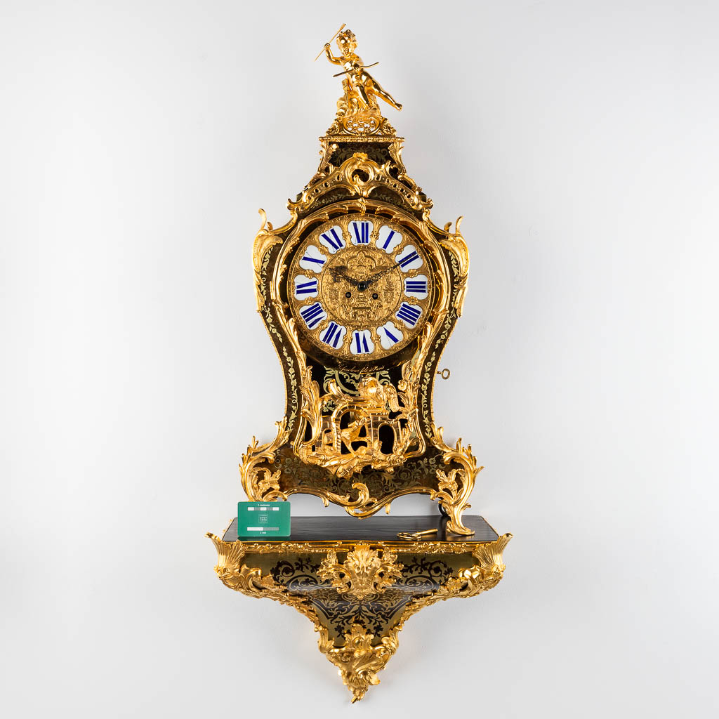 A boulle Cartel clock on a console, tortoiseshell and copper inlay, Napoleon 3, 19th C. Lefaucheur & fils à Paris. (D:26 x 