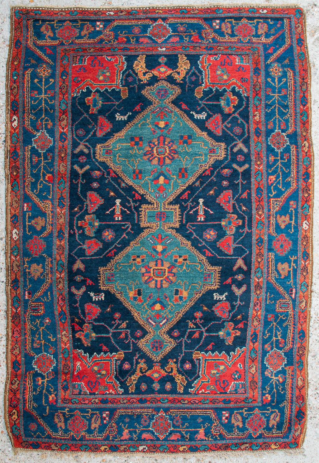 Een Oosters handgeknoopt tapijt. Hamadan. 