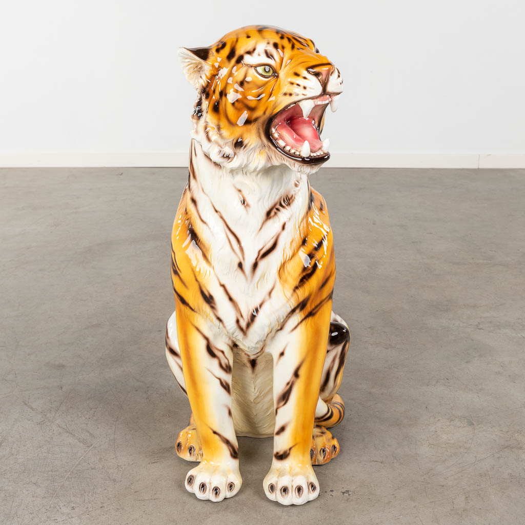 Tiger, a sculpture, glazed ceramics, Italy. 20th C. (D:33 x W:50 x H:79 cm)