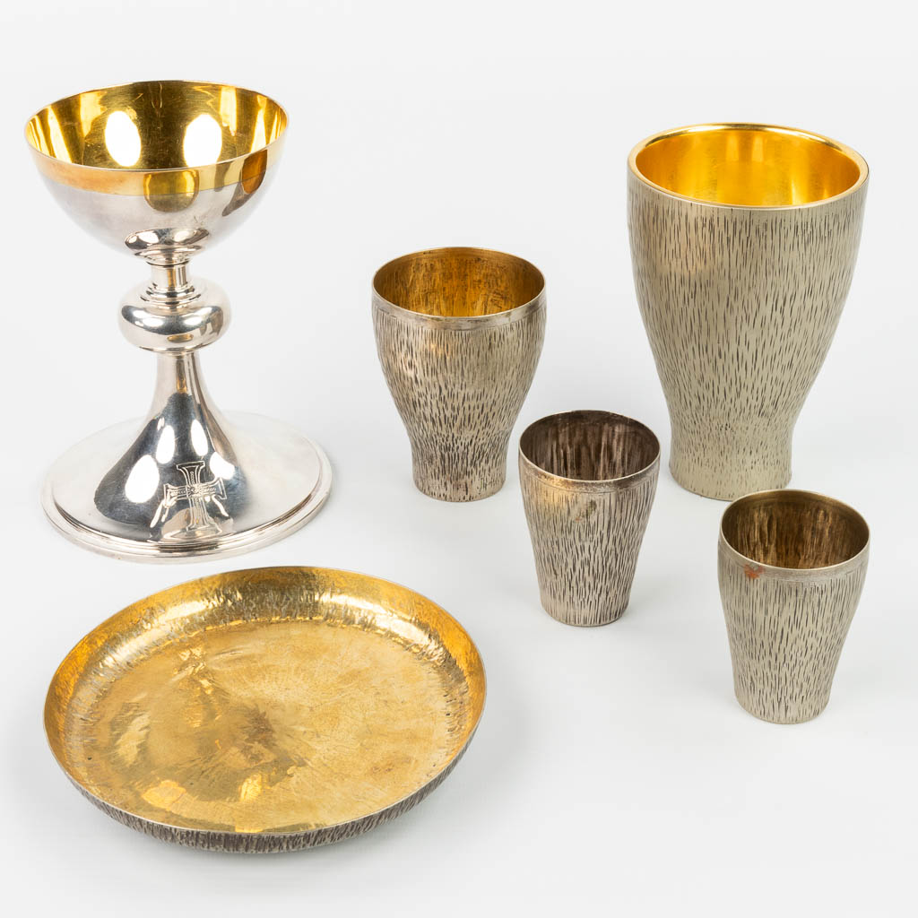 A chalice made of silver and marked Billaux Grossé, Brussels and 5 pieces of silver-plated Holy Mass accessories. (H:16cm)