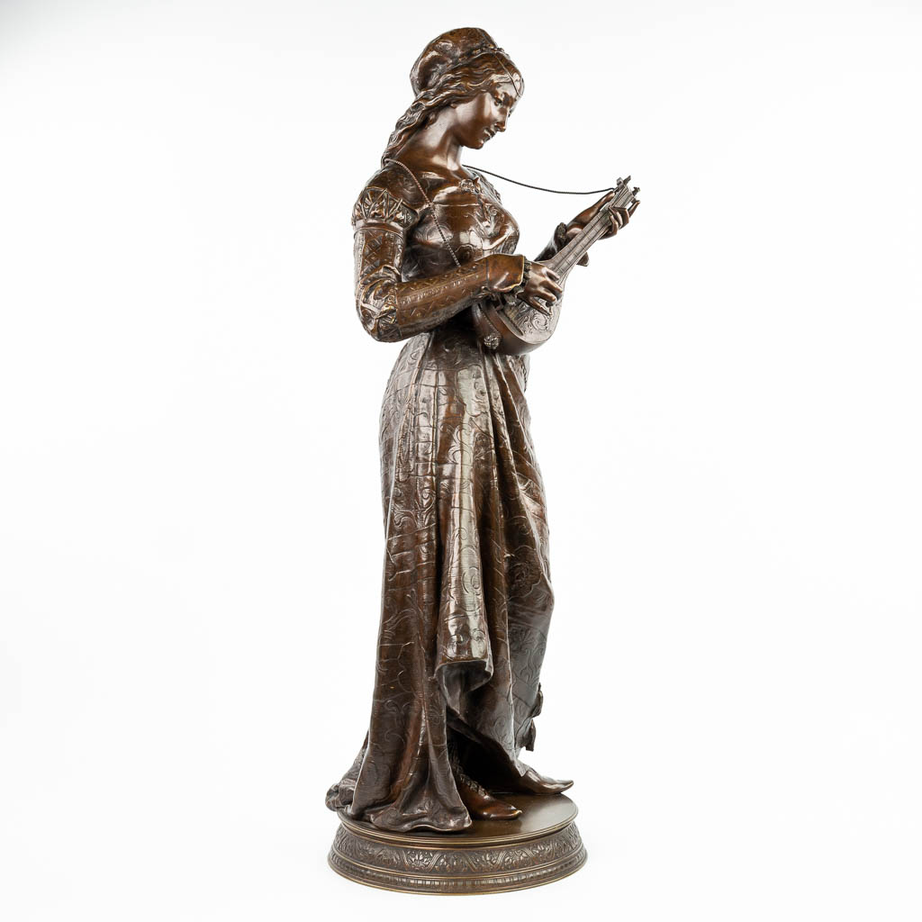 Adrien Etienne GAUDEZ (1845-1902) 'Lady with guitar' an exceptionally large bronze statue. (H:107cm)