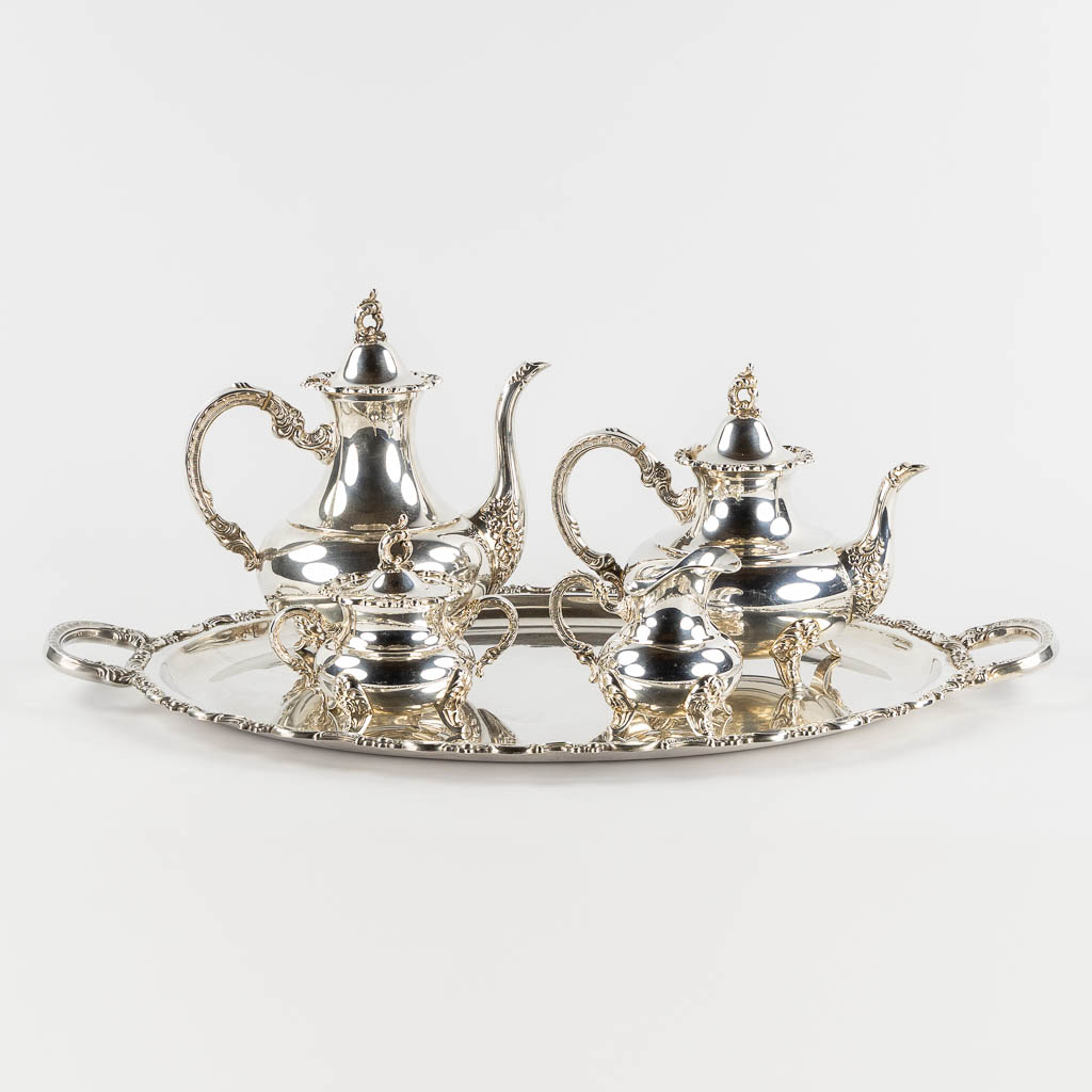 Lot 005 A Coffee and Tea service with a platter, silver, Germany. 925/1000. 4,049kg. (L:44,5 x W:69 cm)