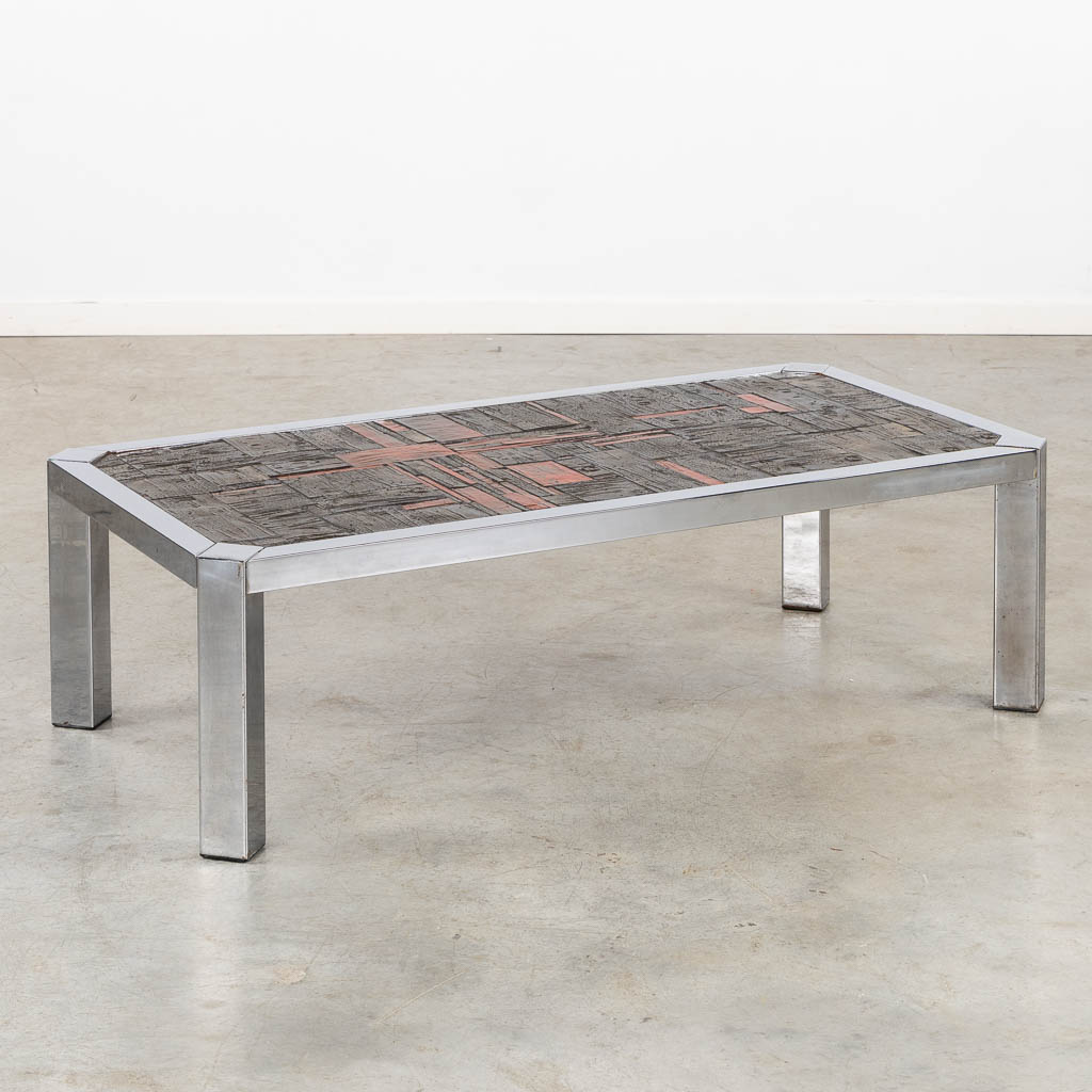 A mid-century coffee table with a ceramic tile top, circa 1960. (L:60 x W:120 x H:36 cm)
