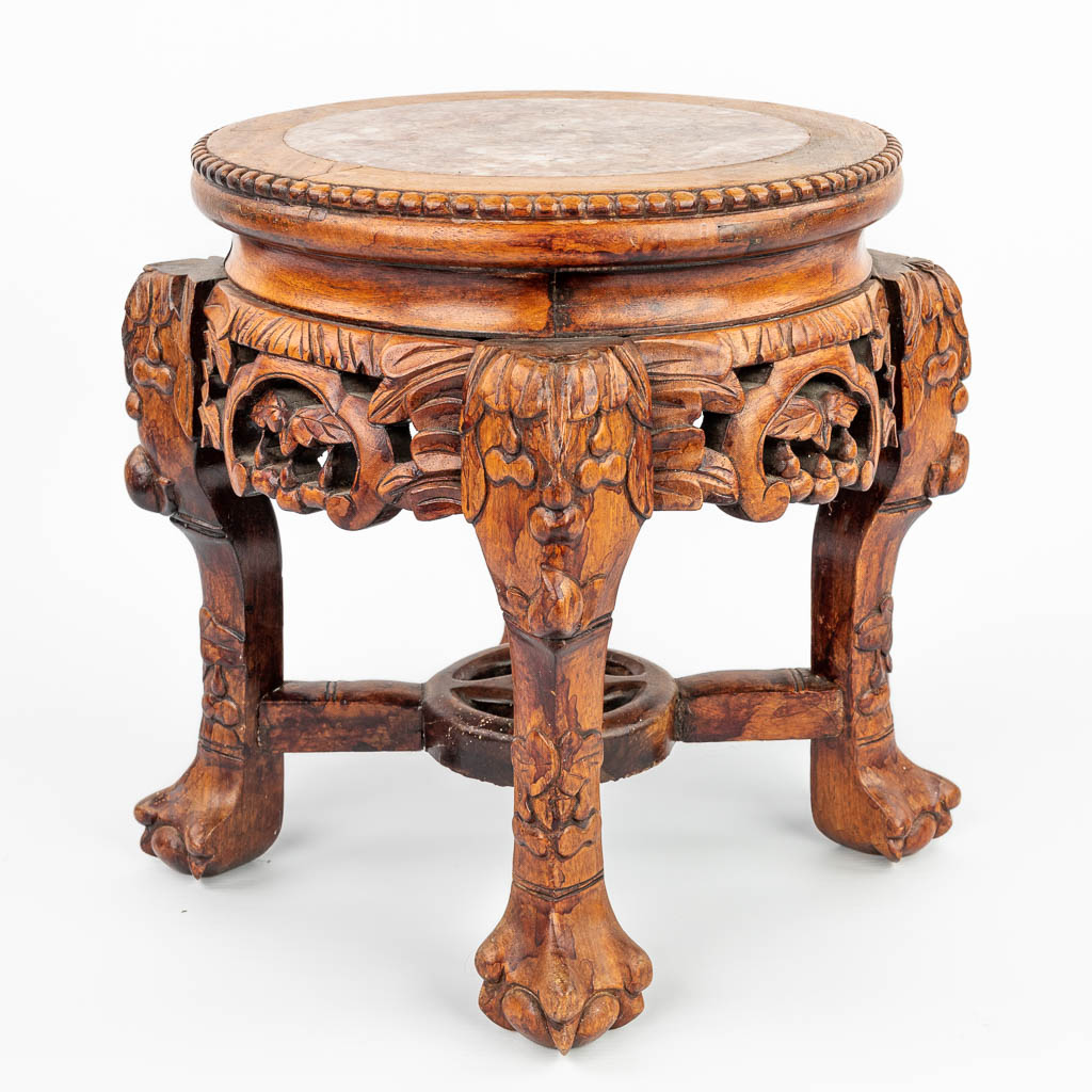 Lot 076 A stand made of Chinese hardwood and finished with marble. (H:34cm)