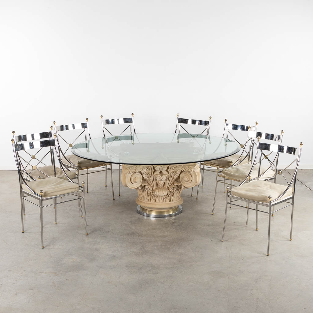 A large Resine Corinthian capitel dining room table and 8 metal chairs. (H:72 x D:180 cm)