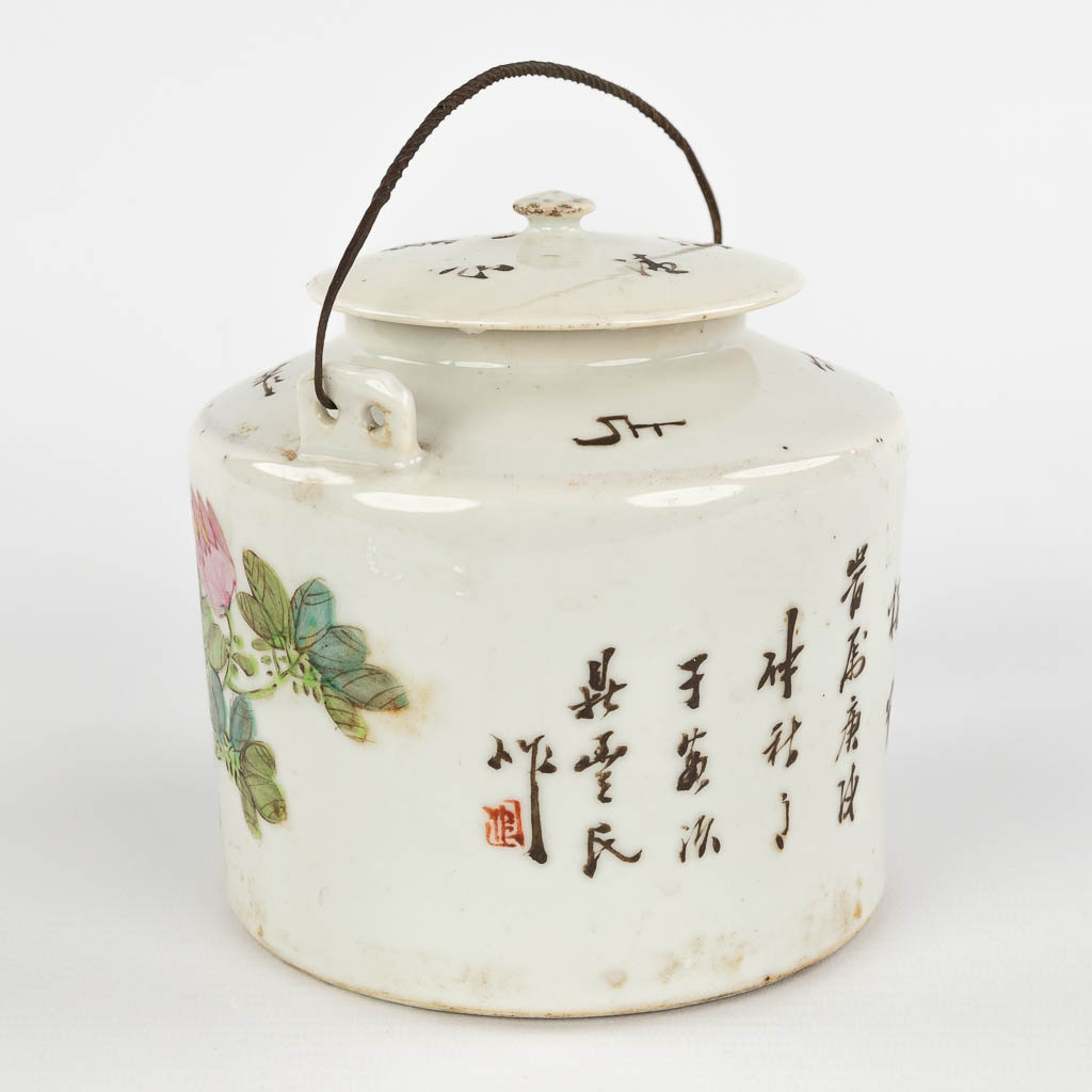 A Chinese tea pot decorated with birds and calligraphic texts. 19th/20th C. (D:12 x W:16 x H:13 cm)